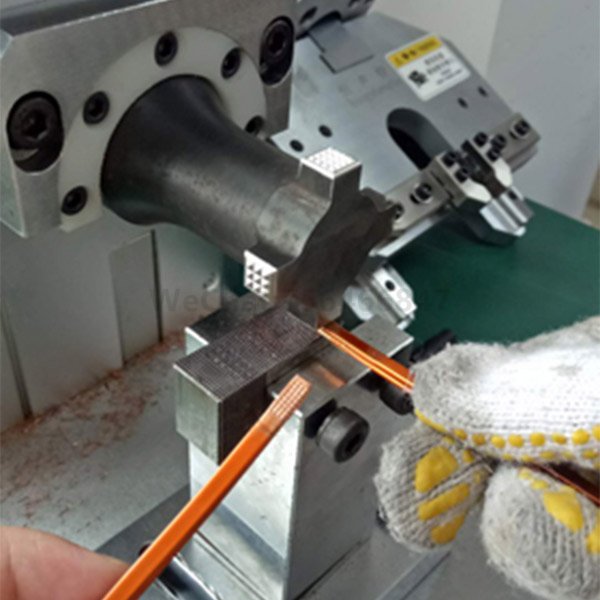 Remove enameled copper sheet and connect ultrasonic metal spot welding machine