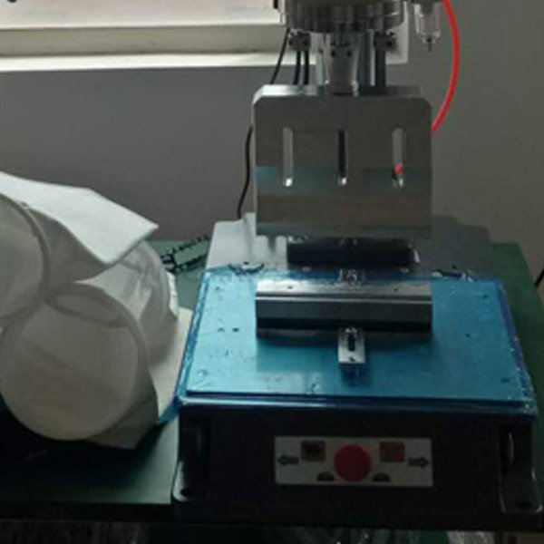 V-shaped sealing ultrasonic welding machine for filter bag tail