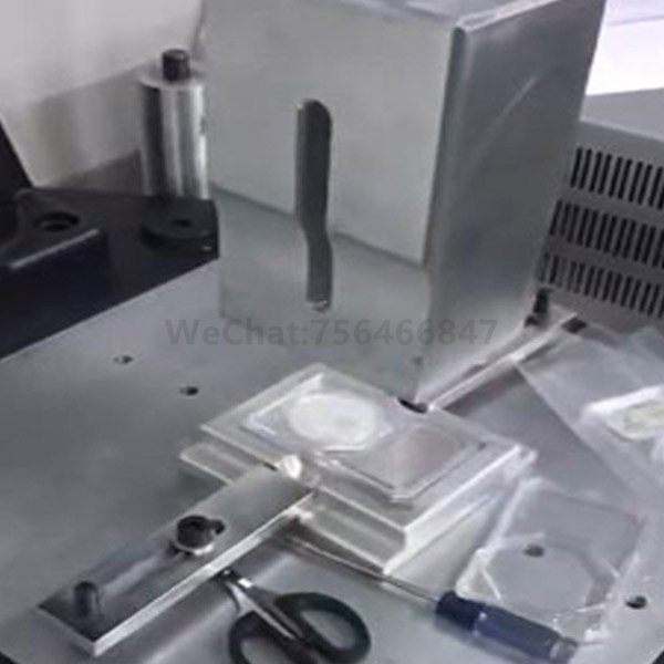 Ultrasonic welding machine for coin packaging box
