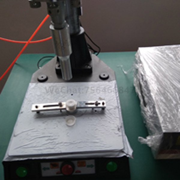 Non-woven breathable bottle cap ultrasonic welding machine