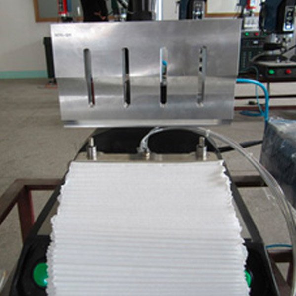 Folding filter paper longitudinal seam welding machine