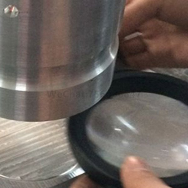 Ultrasonic welding machine for magnifying glass frame